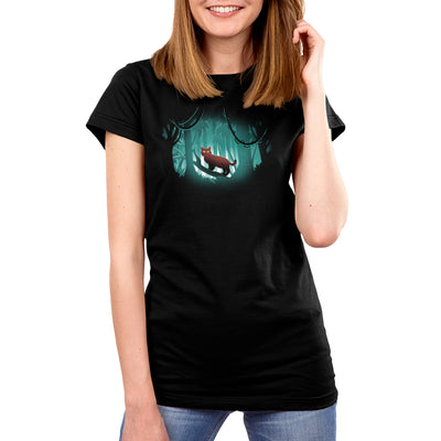 Premium Cotton T-shirt_TeeTurtle black Jungle Lynx apparel featuring a lurking lynx standing on a fallen branch in the middle of a starlit jungle.