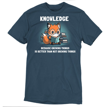 Premium Cotton T-shirt - A super soft cotton apparelin denim blue features an illustration of a fox reading a book, with stacks of books in the background. The text reads, "KNOWLEDGE BECAUSE KNOWING THINGS IS BETTER THAN NOT KNOWING THINGS." A must-have monsterdigital Knowing Things apparel for book lovers!