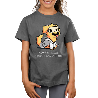 Child wearing a charcoal gray monsterdigital T-shirt featuring a cartoon dog in a lab coat with the text "ALWAYS WEAR PROPER LAB ATTIRE" printed below the image. Made from super soft ringspun cotton, this tee ensures comfort and style for little scientists.