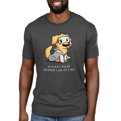 A man in a charcoal gray monsterdigital Lab Attire T-shirt, featuring a cartoon dog wearing lab goggles and a lab coat with the text "Always wear proper lab attire." This super soft ringspun cotton tee offers both comfort and style.