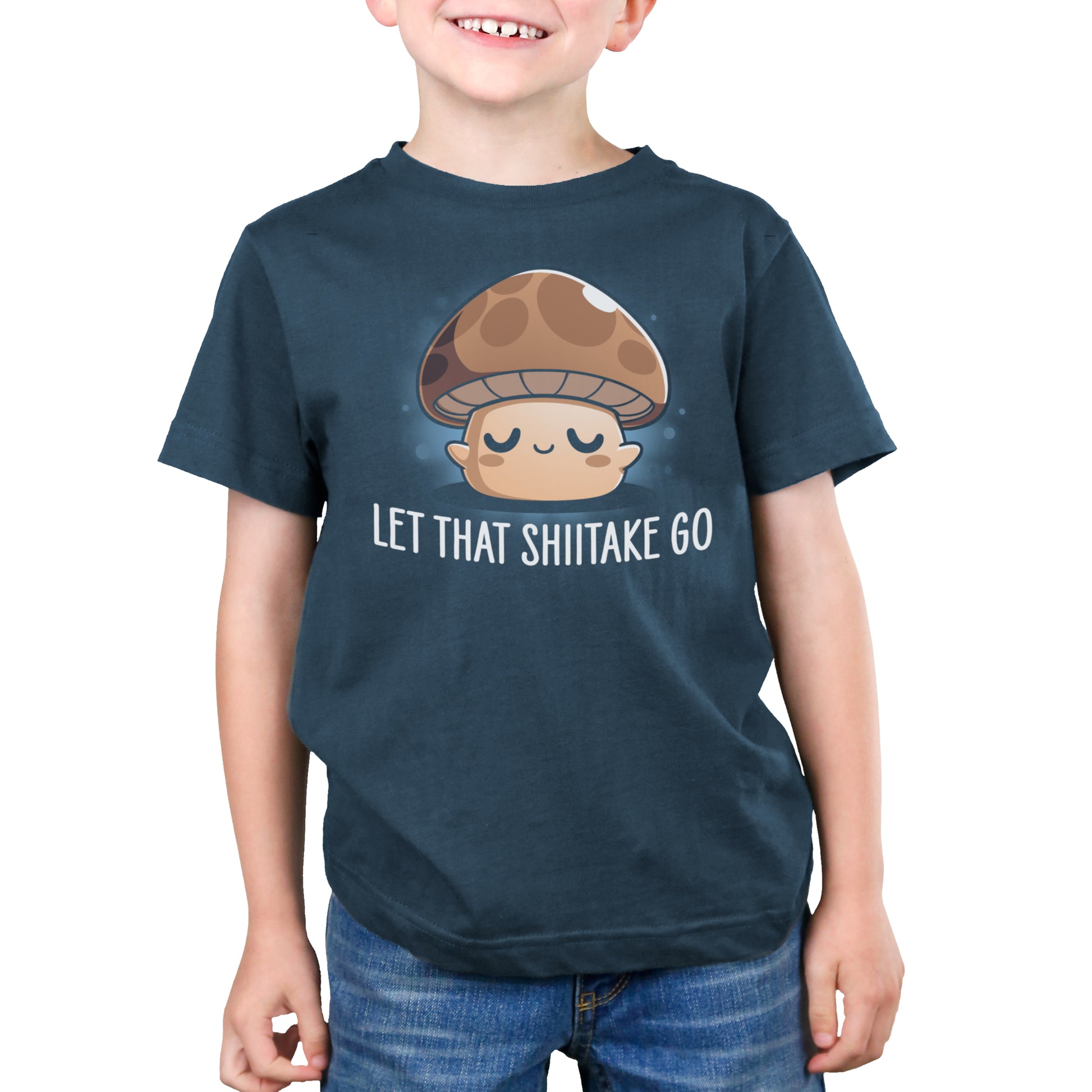 Premium Cotton T-shirt - A child wearing a super soft ringspun cotton denim blue apparel with a cartoon mushroom and the text "Let That Shiitake Go" by monsterdigital printed on it.