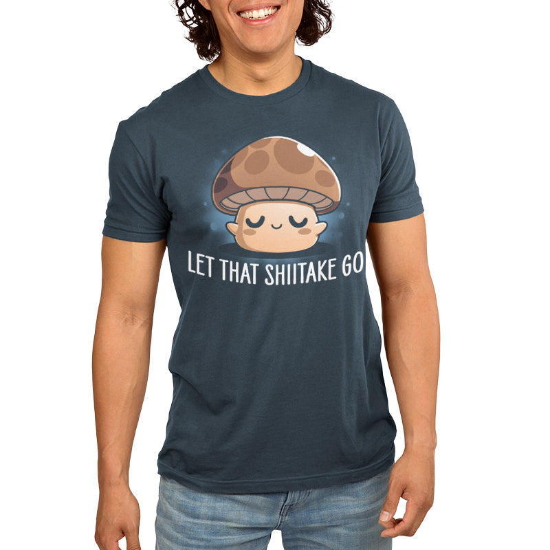 Premium Cotton T-shirt_TeeTurtle Let That Shiitake Go denim t-shirt featuring a cute zen mushroom with its eyes closed and a pun underneath it.