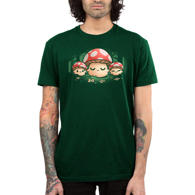 Premium Cotton T-shirt_TeeTurtle forest green Mush Mom apparel featuring a parent mushroom holding the hands of its children mushroom in a forest.