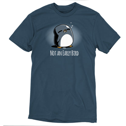 The Not an Early Bird by monsterdigital is a dark denim blue t-shirt featuring a sleepy cartoon penguin with closed eyes and the text "Not An Early Bird" below the image, crafted in super soft ringspun cotton.