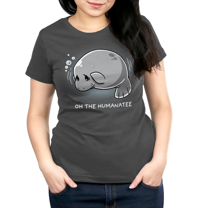 Premium Cotton T-shirt - A person wearing a charcoal gray apparel with a cartoon manaappareland the text "Oh the Humanatee," made from super soft ringspun cotton. This apparel is called Oh the Humanaapparelby monsterdigital.