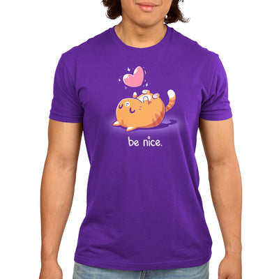 Premium Cotton T-shirt_Teeturtle purple Be Nice apparel featuring a happy orange cat laying on its back with a sparkling pink heart above it and the words 'be nice.' below.