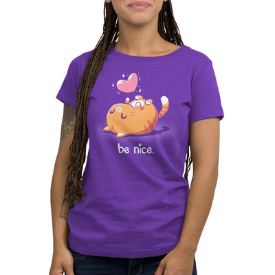 Premium Cotton T-shirt_Teeturtle purple Be Nice apparel featuring a happy orange cat laying on its back with a sparkling pink heart above it and the words 'be nice.' below.