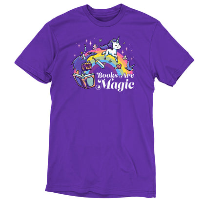 The **Books Are Magic** by **monsterdigital** is a purple unicorn T-shirt made of super soft ringspun cotton, featuring an illustration of a unicorn and a rainbow above books, with the text "Books Are Magic.