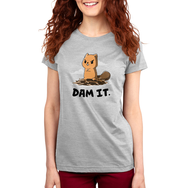 Premium Cotton T-shirt_TeeTurtle Dam It Silver Gray t-shirt featuring A cartoon beaver with an angry expression stands on a dam of sticks with the text "DAM IT." below. 