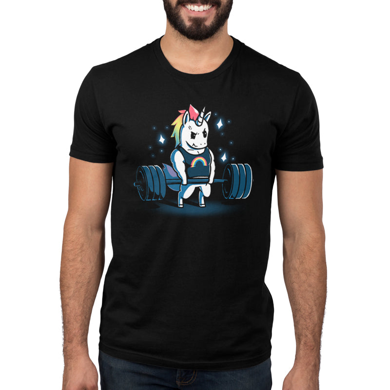 Premium Cotton T-shirt_TeeTurtle Gym Unicorn black t-shirt featuring an illustration of a white unicorn with rainbow hair wearing a black shirt with a rainbow on it lifting weights surrounded by stars. 