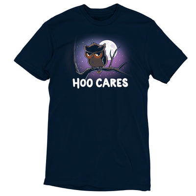 Premium Cotton T-shirt_TeeTurtle navy blue Hoo Cares apparel featuring an owl with a deadpan expression perched on a branch with a moonlit sky in the background with the caption, “Hoo Cares“.
