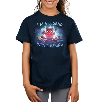 Premium Cotton T-shirt_TeeTurtle navy blue I'm a Legend in the Baking apparel featuring a red panda with lit up eyes holding a spatula and hand mixer in a kitchen surrounded by baking equipment, such as a sheet of cookies, eggs, and flour.