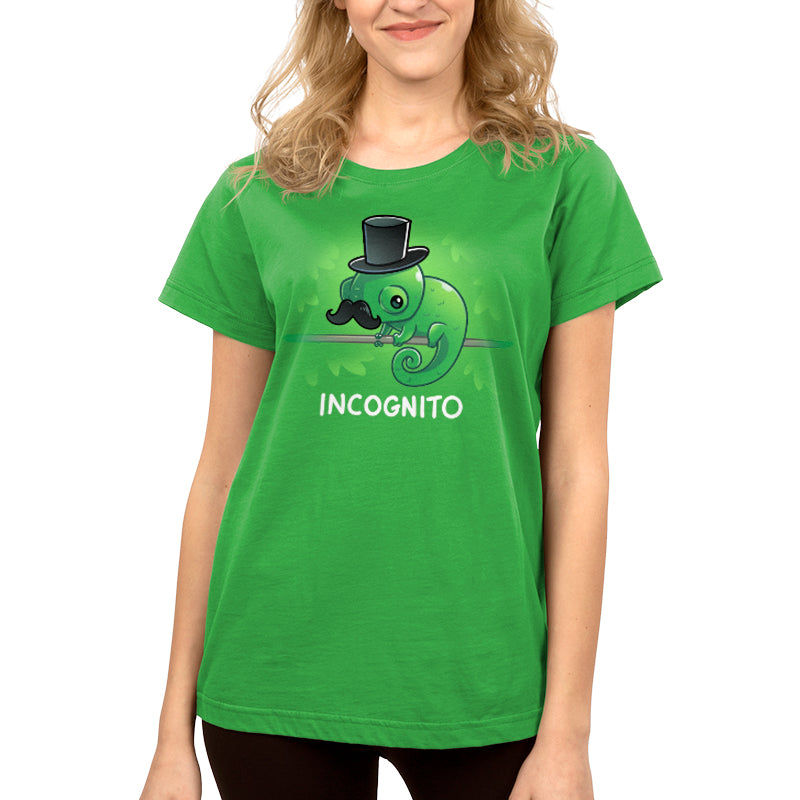 Premium Cotton T-shirt_TeeTurtle Incognito apple green apparel featuring a chameleon wearing a top hat and moustache perched on a stick hidden among leaves.