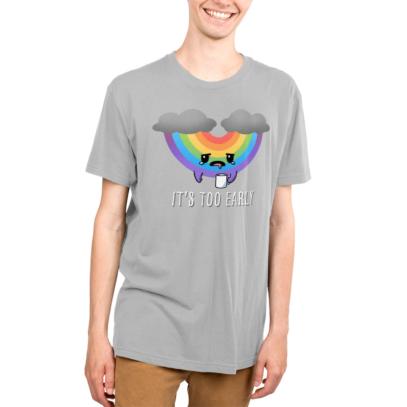 Premium Cotton T-shirt - Person wearing a super soft ringspun cotton gray apparel featuring a cartoon rainbow with a coffee cup and the phrase "It's too early" from monsterdigital's It's Too Early collection.