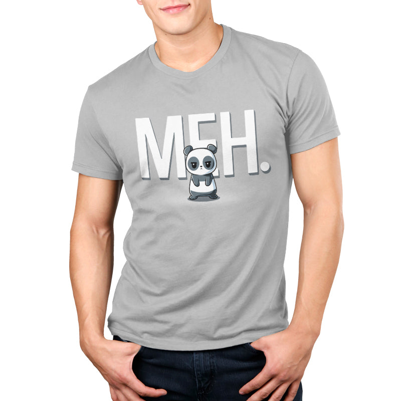 Premium Cotton T-shirt_TeeTurtle silver gray Meh Panda apparel featuring a panda with a deadpan expression with the gigantic word, “MEH.“ in the background.