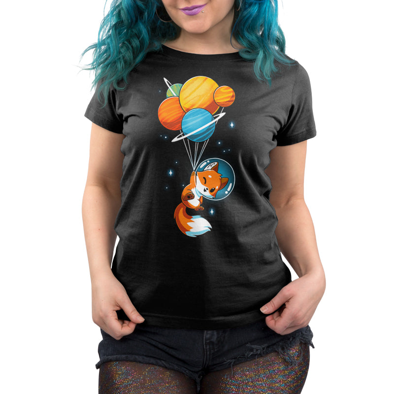 Premium Cotton T-shirt_A cartoon Foxy Astronaut in a space helmet is being lifted by balloons shaped like planets against a dark background. This whimsical design is printed on a super soft ringspun cotton Unisex Tee, perfect for space lovers of all ages. The Foxy Astronaut Unisex apparelby monsterdigital is sure to delight fans everywhere.