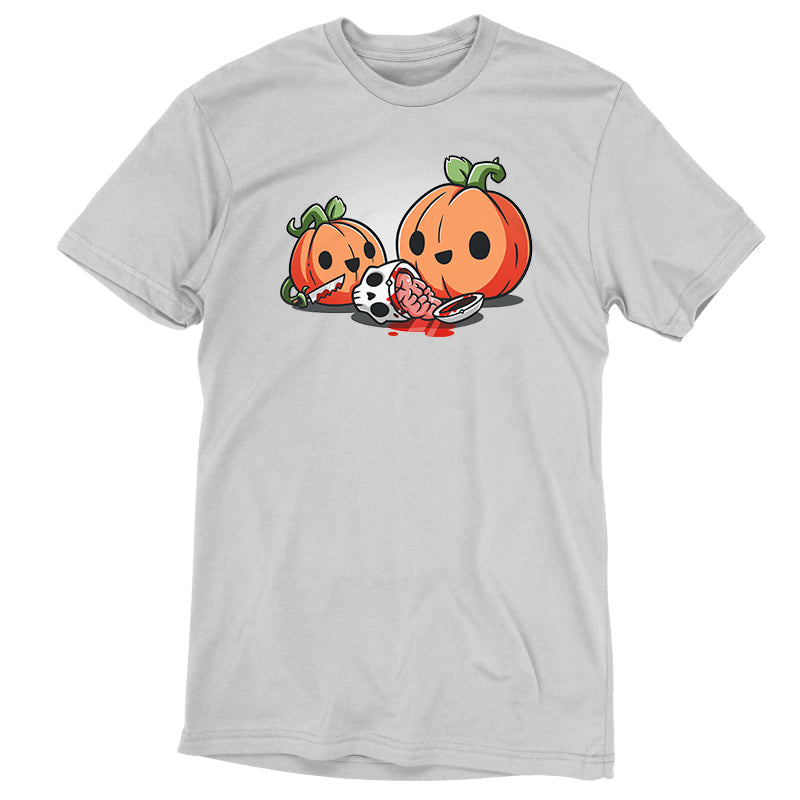 A gray monsterdigital Pumpkin Carving t-shirt features two cartoon pumpkins with smiling faces; one is holding a spoon and appears to have eaten the contents of the head of another figure lying on the ground. Crafted from super soft ringspun cotton, it's reminiscent of a quirky scene straight out of a true crime documentary.