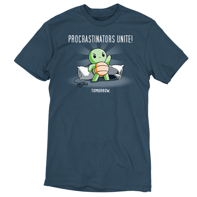 Premium Cotton T-shirt_TeeTurtle Procrastinators Unite! (Tomorrow) denim blue t-shirt featuring a green turtle standing on pillows with a game controller nearby, and text that reads, "Procrastinators Unite! Tomorrow."