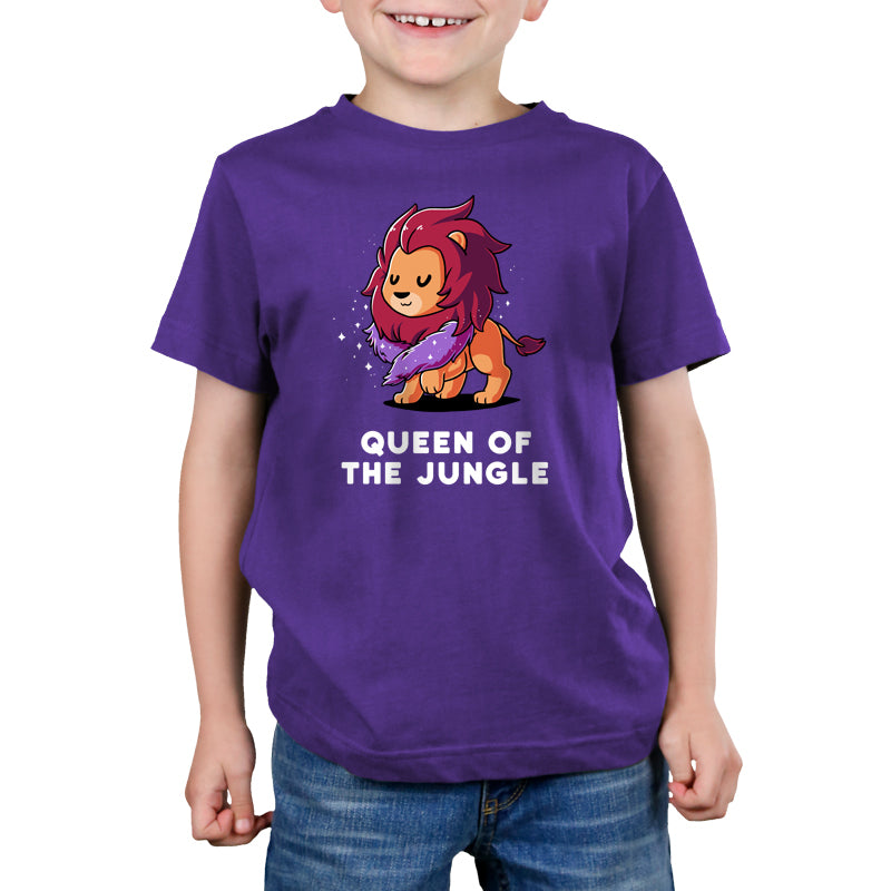 Premium Cotton T-shirt - A child wears a super soft ringspun cotton apparel in purple, featuring a cartoon lion and the text "QUEEN OF THE JUNGLE." This unisex apparelfrom monsterdigital called Queen of the Jungle is perfect for any little adventurer.