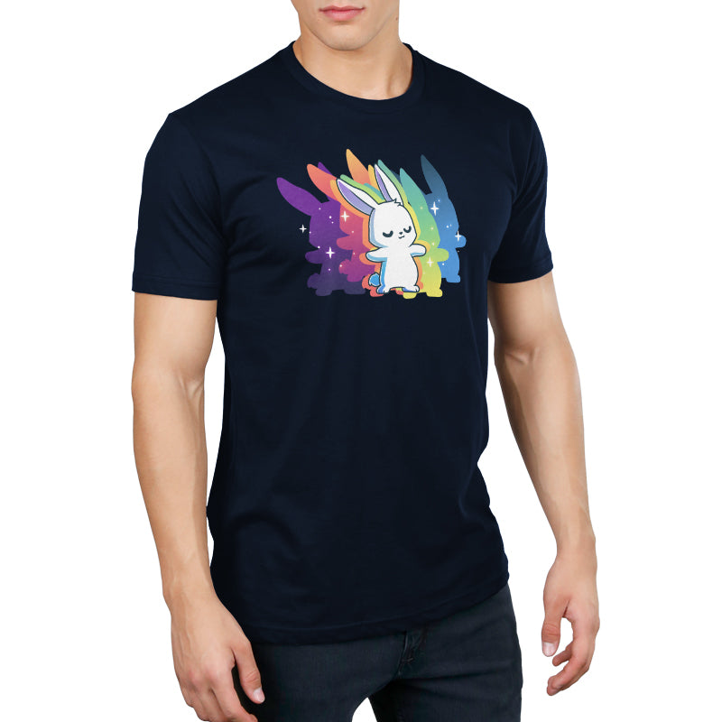 A person wearing a navy blue monsterdigital Queer Vibes Only t-shirt featuring a white cartoon bunny with a rainbow and star background.