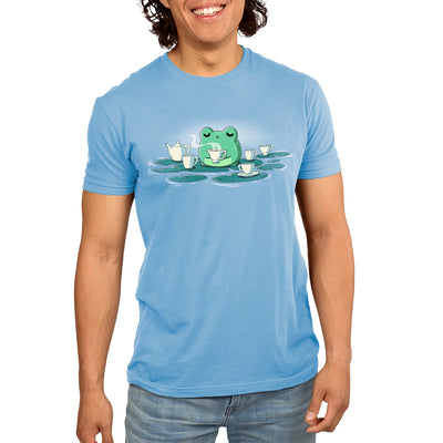 Premium Cotton T-shirt_TeeTurtle light blue Ribbit and Sip apparel featuring a frog drinking coffee sitting on a lily pad surrounded by lily pads with coffee cups on them.