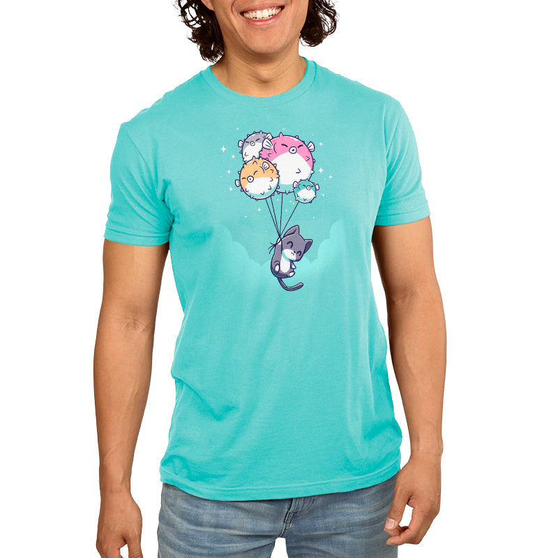 Premium Cotton T-shirt_TeeTurtle Sky High caribbean blue t-shirt featuring a cat holding onto strings attached to five pufferfish balloons floating against a turquoise sky.