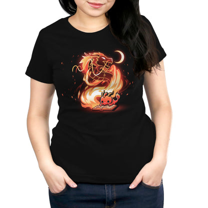 Premium Cotton T-shirt_TeeTurtle Tale Of Scales black t-shirt featuring an illustration of a little red dragon reading a book that has a large, fiery dragon swirling in flames coming out from the book and a small crescent moon in the top right corner near the large dragon's head.