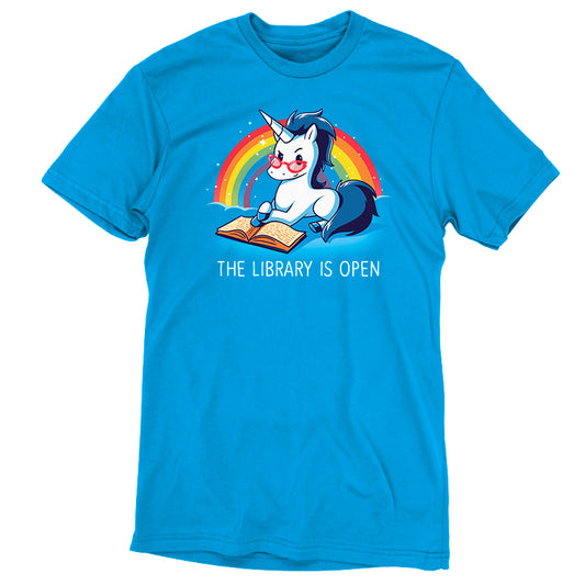 Discover enchantment with our cobalt blue t-shirt, boasting a cartoon unicorn reading a book against a rainbow backdrop. Made from Super Soft Ringspun Cotton, this 