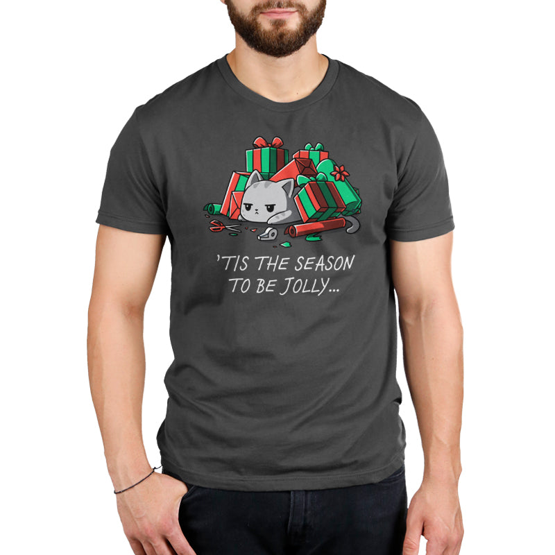 Premium Cotton T-shirt - A man wears a charcoal gray Tis the Season to be Jolly apparel from monsterdigital, featuring a grumpy cat lying among Christmas presents. Made from super soft ringspun cotton, it's the perfect blend of comfort and holiday humor.