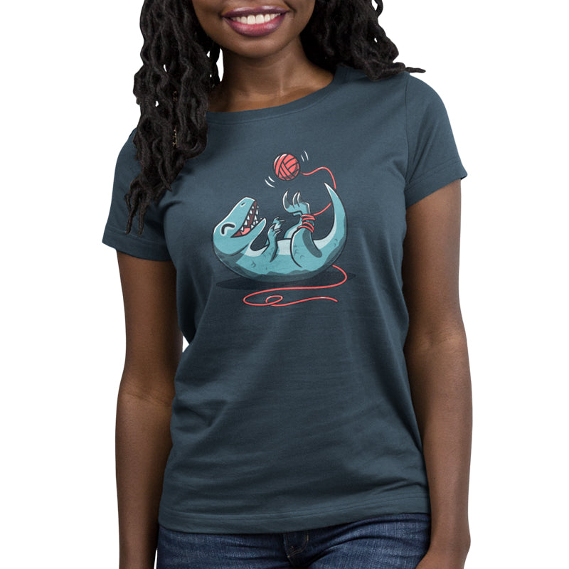 Premium Cotton T-shirt_TeeTurtle Velocikitty Denim t-shirt featuring an illustration of a velociraptor laying on its back, entangled in red yarn, playing happily with a ball of yarn above it in the air.