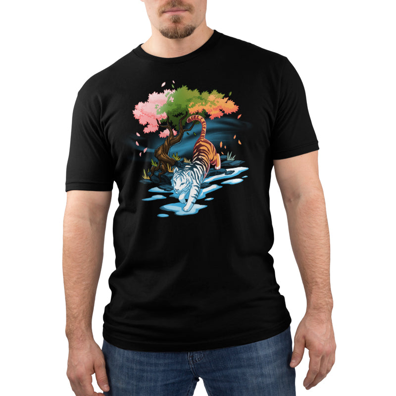 Premium Cotton T-shirt - Man wearing a monsterdigital black apparel with an illustration of a white tiger near a tree with colorful leaves.