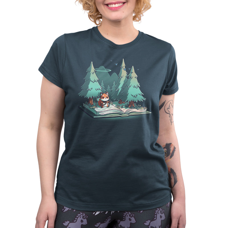 Premium Cotton T-shirt - Person wearing a denim blue apparel with an illustration of a panda reading "The Adventurer's Tale" in the forest by monsterdigital.