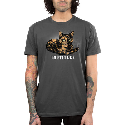 Premium Cotton T-shirt_TeeTurtle Tortitude. charcoal gray t-shirt featuring a tortoiseshell cat with its paws crossed smiling.