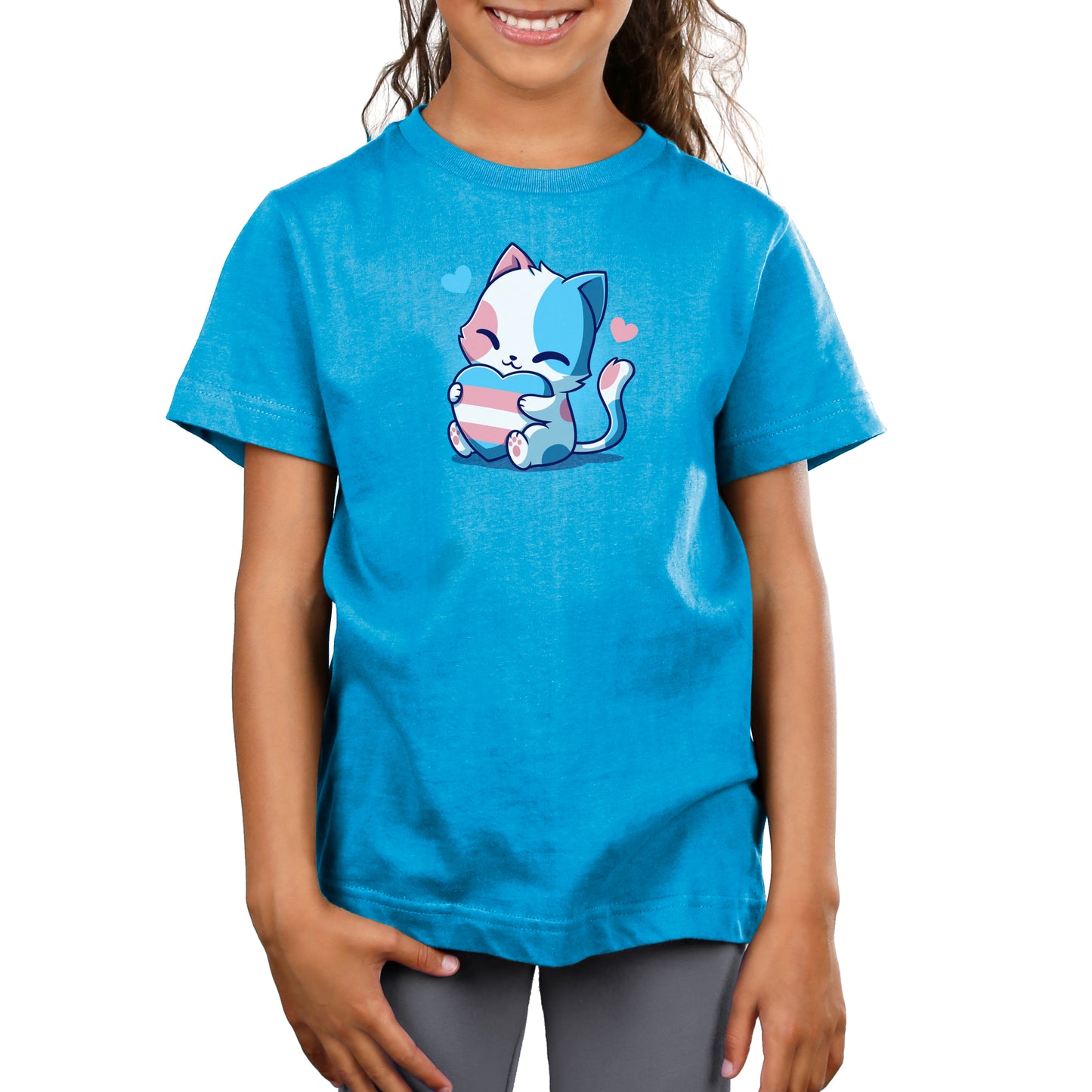 Premium Cotton T-shirt - A person wearing a super soft ringspun cotton, cobalt blue apparel with a graphic of a cute, blue-and-pink cartoon cat holding a heart. The apparel is the "Trans Purride" from monsterdigital.