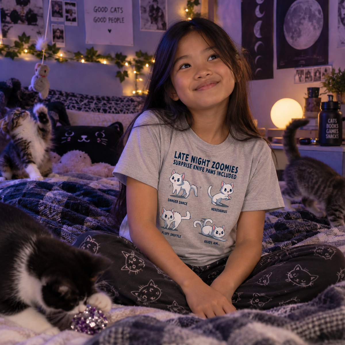 Kids' Classic T-Shirt_TeeTurtle light gray Late Night Zoomies Kids' Classic T-Shirt featuring four energetic white cats in different playful poses with the text "Late Night Zoomies, Surprise Knife Paws Included" and labels "Danger Dance," "Nekosaurus," "Fluff Shuffle," and "Ready, Aim..."