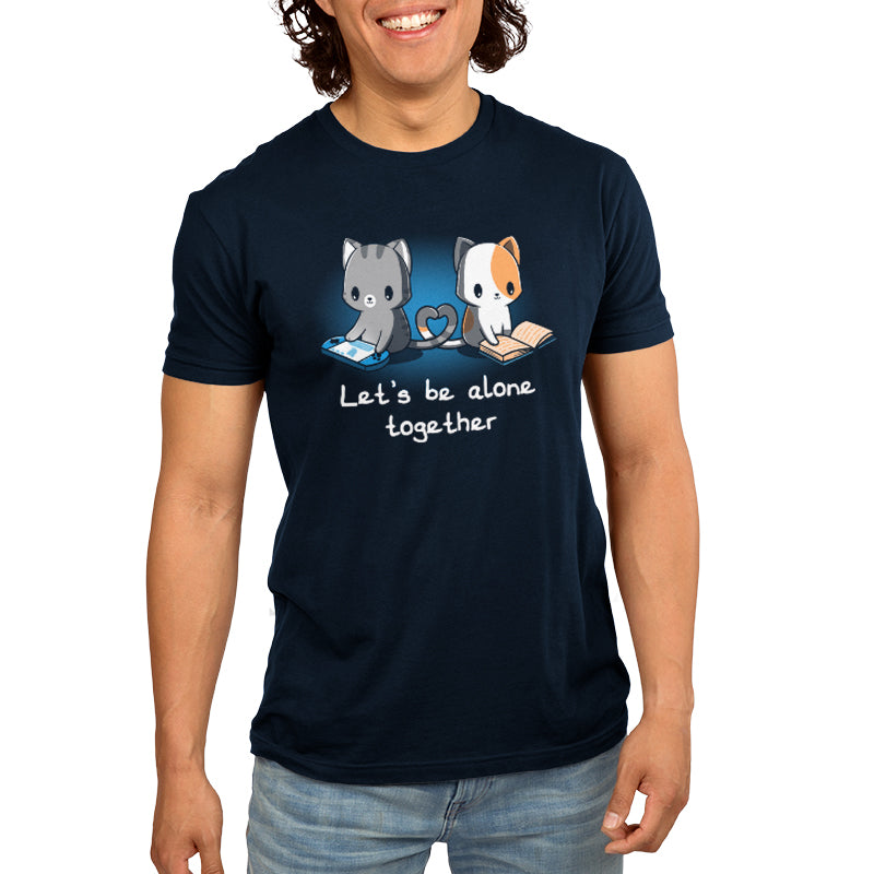 A man wearing a navy blue TeeTurtle "Let's Be Alone Together" t-shirt, expressing the sentiment of "let's be friends.