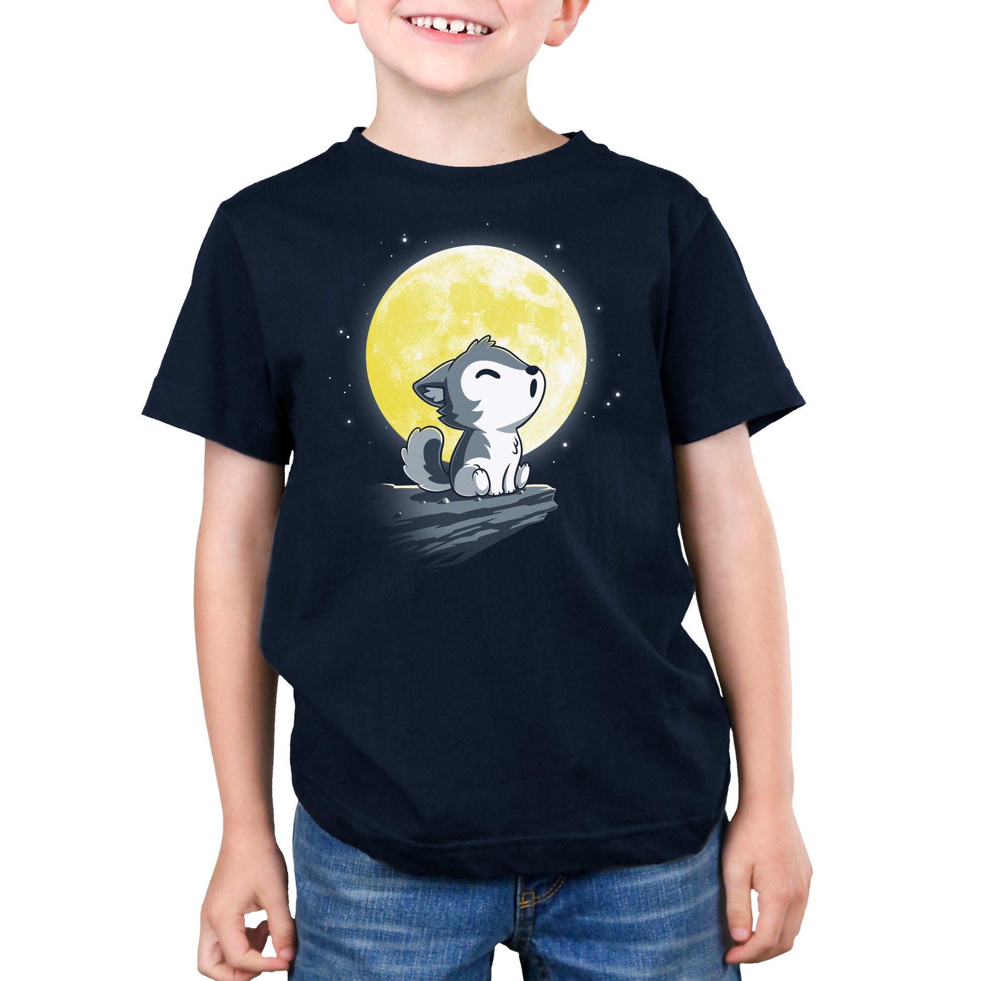 A young boy wearing a Lil' Werewolf t-shirt from TeeTurtle.