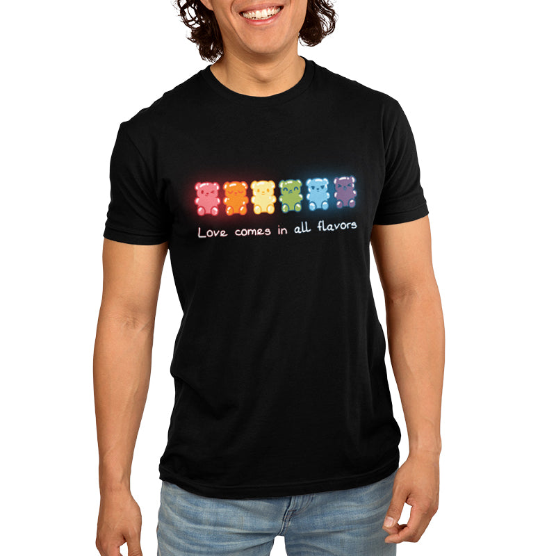 A man wearing a black t-shirt with the product name "Love Comes In All Flavors" and the brand name "TeeTurtle" on it.