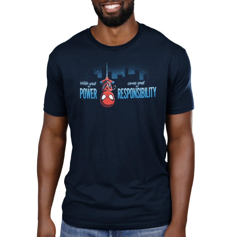 A man is wearing an officially licensed Marvel Spider-Man T-shirt with the superhero quote "With Great Power Comes Great Responsibility".