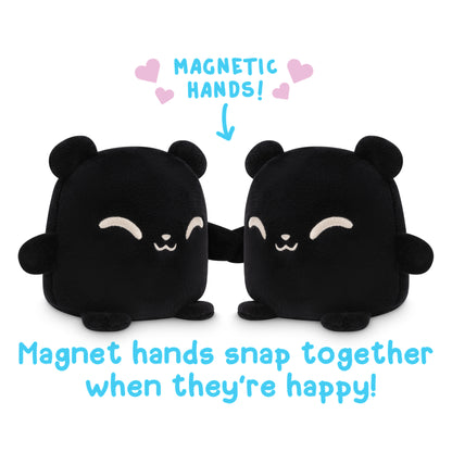 Two TeeTurtle Reversible Bear Plushmates (Black) with magnetic hands snap together when they're happy.