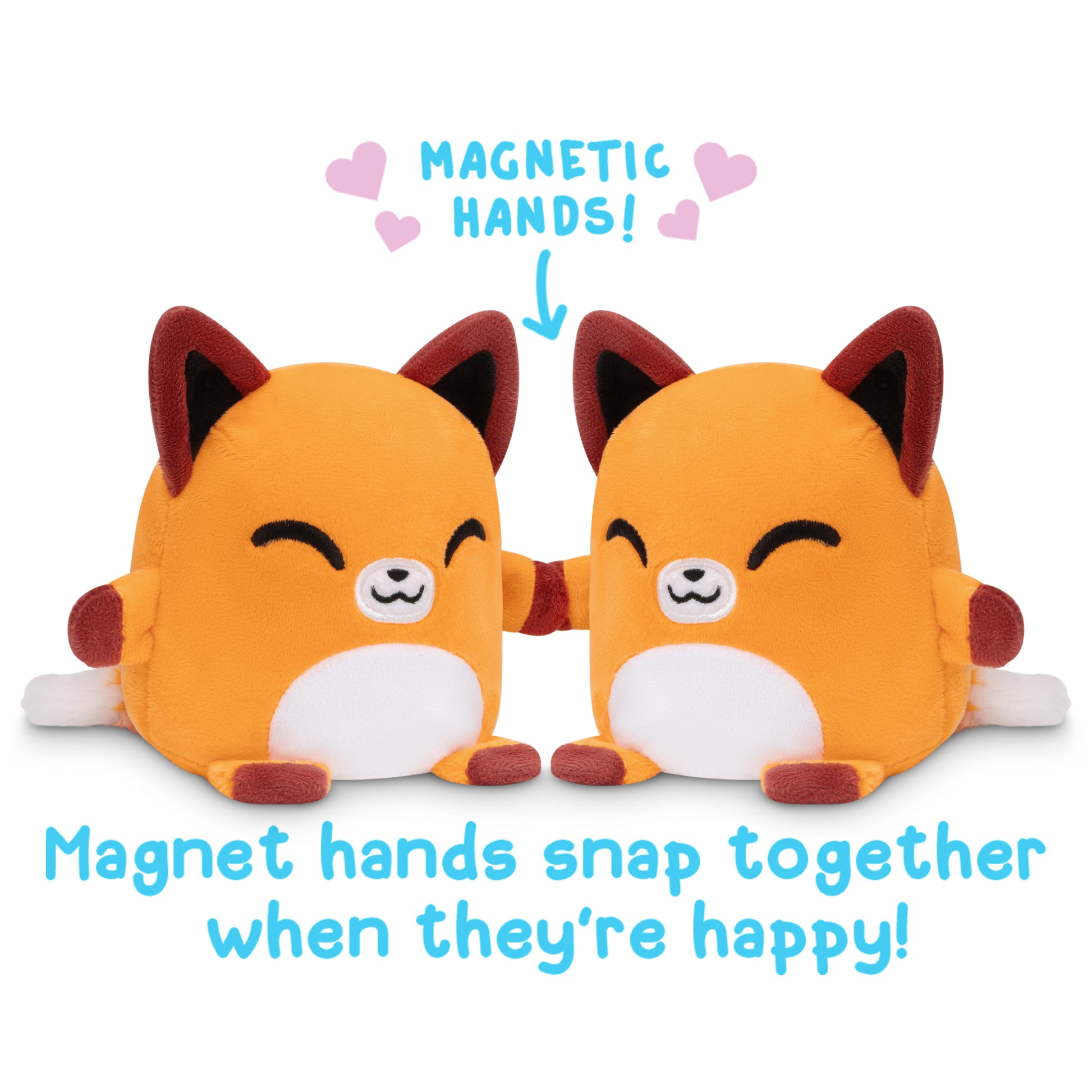 Two TeeTurtle Reversible Fox Plushmates with magnetic hands that snap together when they're happy. These plushmates, designed by TeeTurtle, offer a unique and charming way to bring joy and companionship.