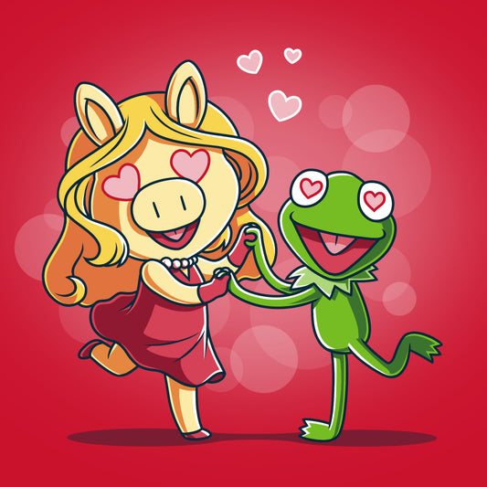 A officially licensed Miss Piggy and Kermit T-shirt featuring a frog and a girl dancing on a red background, inspired by Disney.