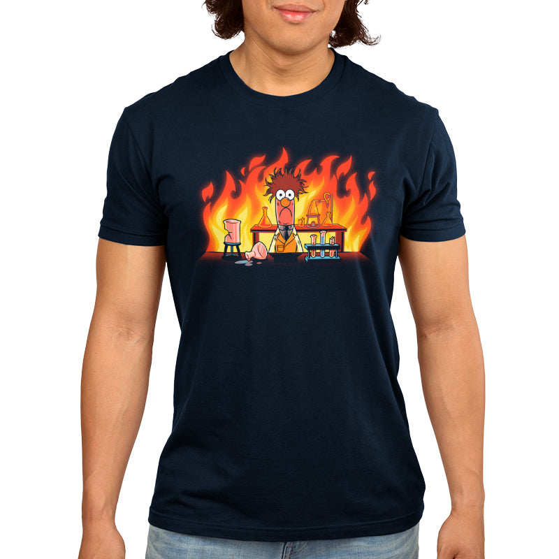 An officially licensed Muppets t-shirt featuring an image of Beaker's Lab Explosion with a man with a fire in front of him.