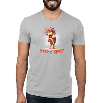 A man wearing an officially licensed Muppets t-shirt with the keyword "Keep it Spicy".