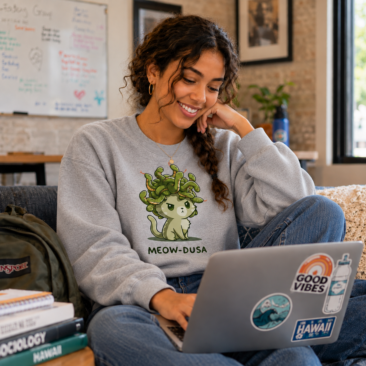 Crew Neck Sweatshirt_TeeTurtle heather gray Meow-dusa apparel featuring a grumpy green cat with a nest of snakes coiled on its head, and the caption, "Meow-dusa".