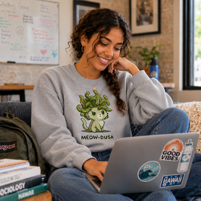 Crew Neck Sweatshirt_TeeTurtle heather gray Meow-dusa apparel featuring a grumpy green cat with a nest of snakes coiled on its head, and the caption, "Meow-dusa".