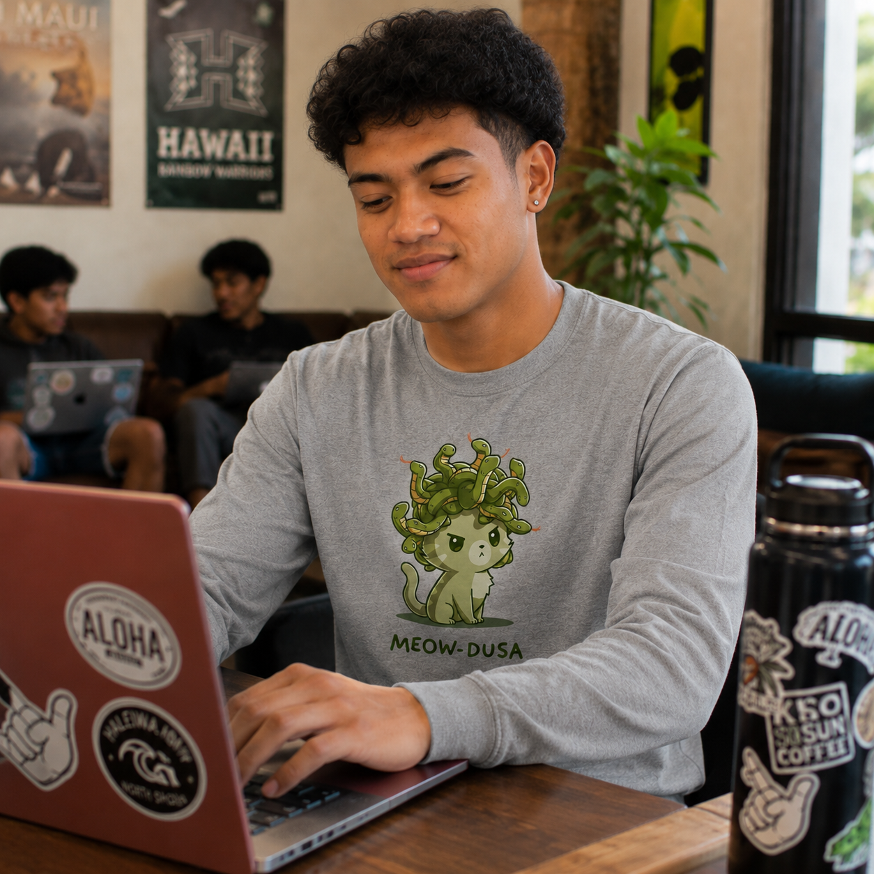 Long Sleeve T-shirt_TeeTurtle heather gray Meow-dusa apparel featuring a grumpy green cat with a nest of snakes coiled on its head, and the caption, "Meow-dusa".
