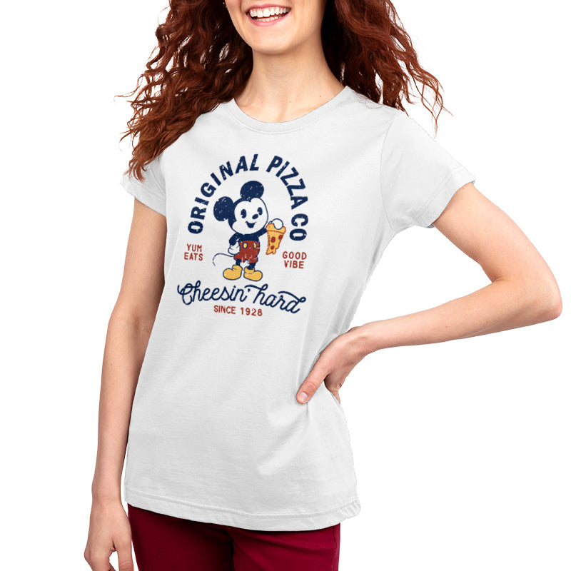 A woman wearing a Disney Officially Licensed Mickey's Pizza Company T-shirt.