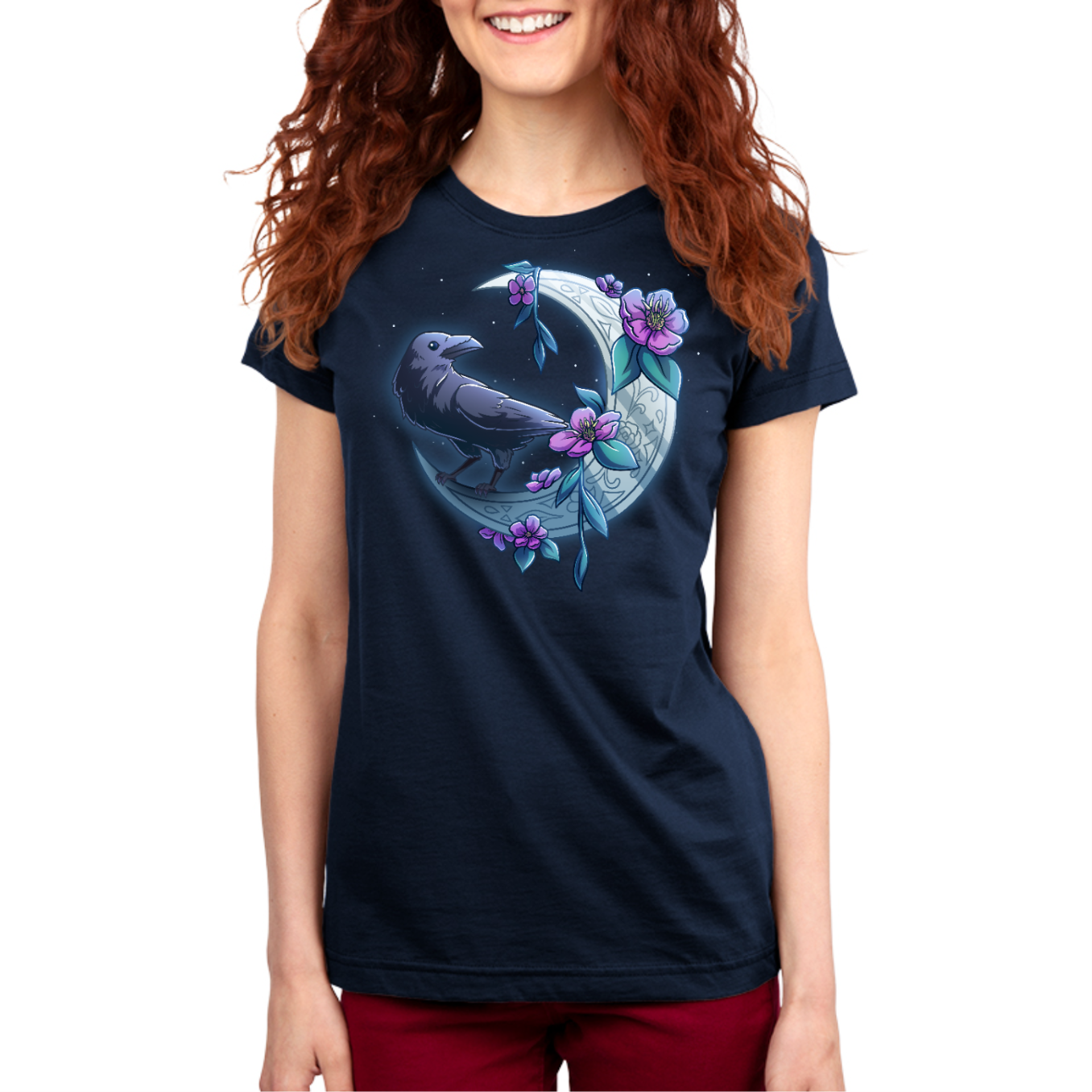 Premium Cotton T-shirt_TeeTurtle navy blue Midnight Perch Premium Cotton T-shirt featuring a raven perched and glowing atop a fancy crescent moon with pink flowers and stars in the background