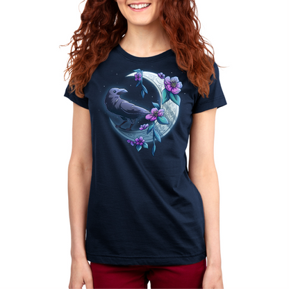 Premium Cotton T-shirt_TeeTurtle navy blue Midnight Perch Premium Cotton T-shirt featuring a raven perched and glowing atop a fancy crescent moon with pink flowers and stars in the background